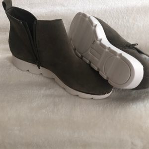 Brand new trendy Alex Marie boots, rubber soled with zippers down the side